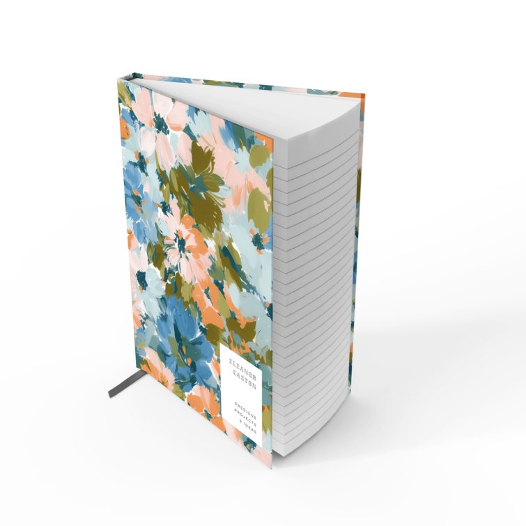 Floral pattern notebook design with abstract flowers covering the front and back spread.