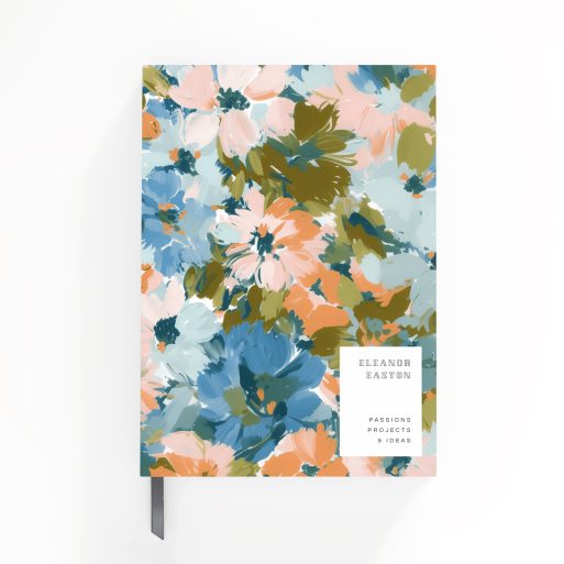 Floral pattern notebook design with abstract flowers covering the front and back spread.