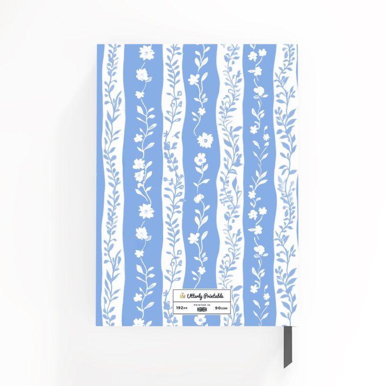 Floral design gardening notes notebook with one placeholder photo on the cover, featuring blue and white botanical pattern.