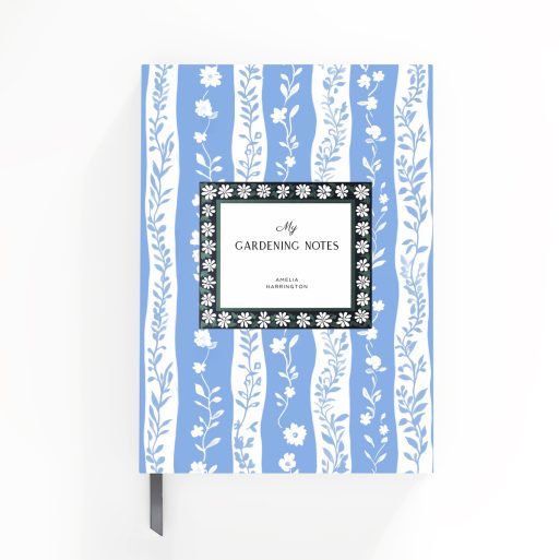 Floral design gardening notes notebook with one placeholder photo on the cover, featuring blue and white botanical pattern.