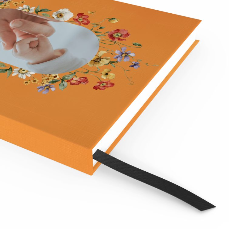 Floral design notebooks with one photo on an orange background by Utterly Printable.