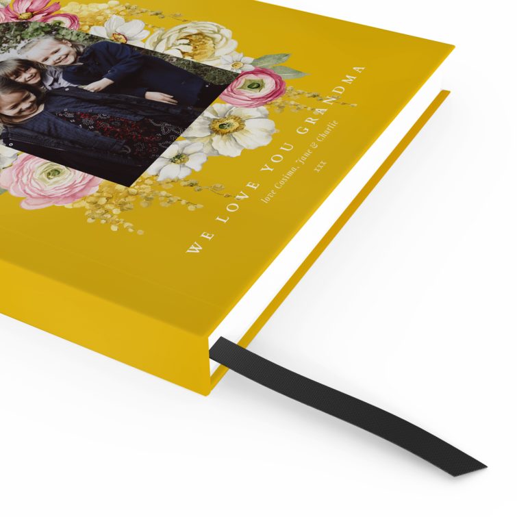 Floral photo design on a yellow cover for personalised notebooks with one image placeholder.