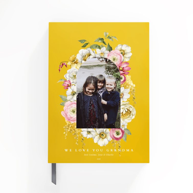 Floral photo design on a yellow cover for personalised notebooks with one image placeholder.