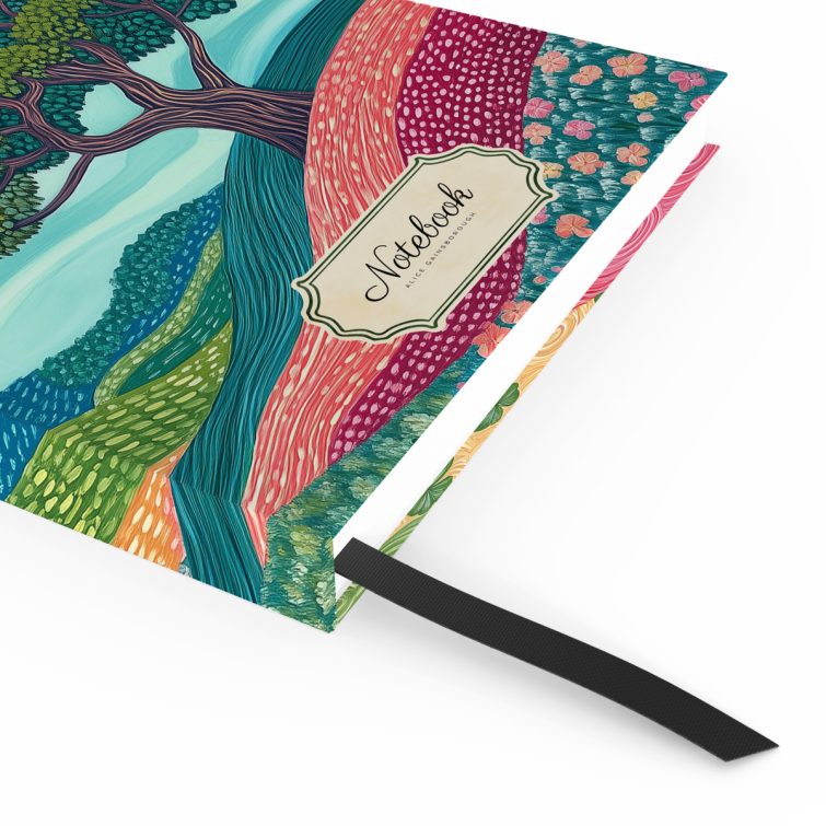 Illustrated notebook design with colourful landscape and two stylised trees, featuring Utterly Printable branding on the cover.