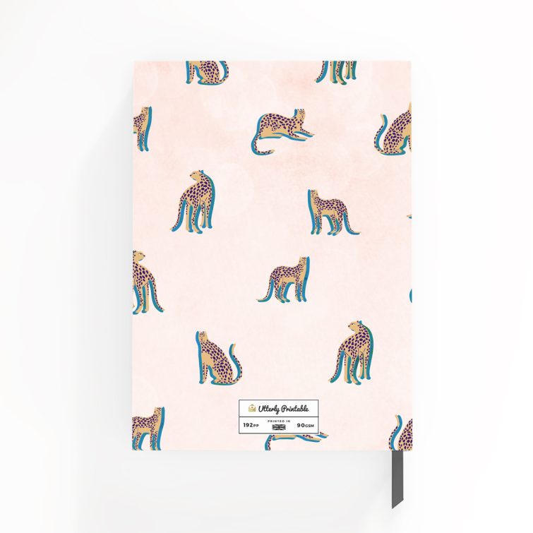 Colourful cheetah pattern notebook design with no photos on the cover spread.