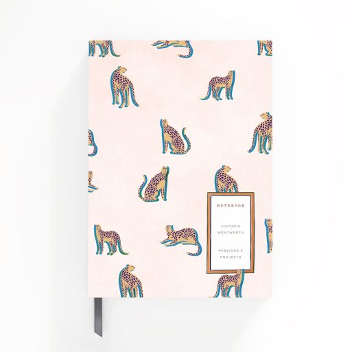 Colourful cheetah pattern notebook design with no photos on the cover spread.