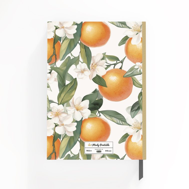 Floral and citrus-themed portrait notebook cover design with orange and white blossoms, featuring three decorative photos.