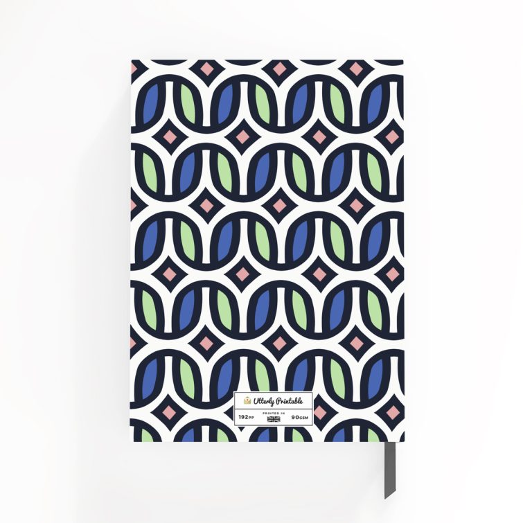 Colourful geometric patterned notebooks design with one placeholder photo on a portrait-oriented cover spread by Utterly Printable.