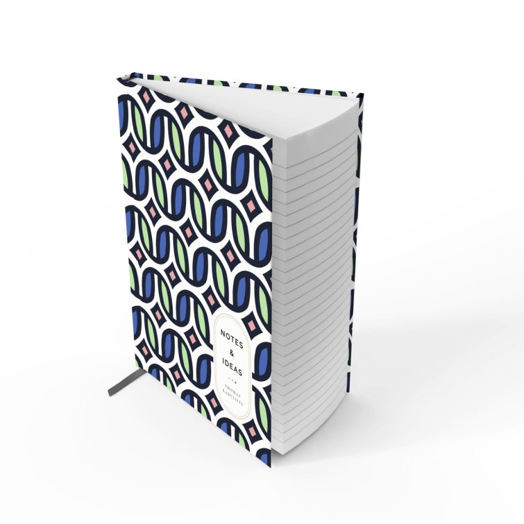 Colourful geometric patterned notebooks design with one placeholder photo on a portrait-oriented cover spread by Utterly Printable.