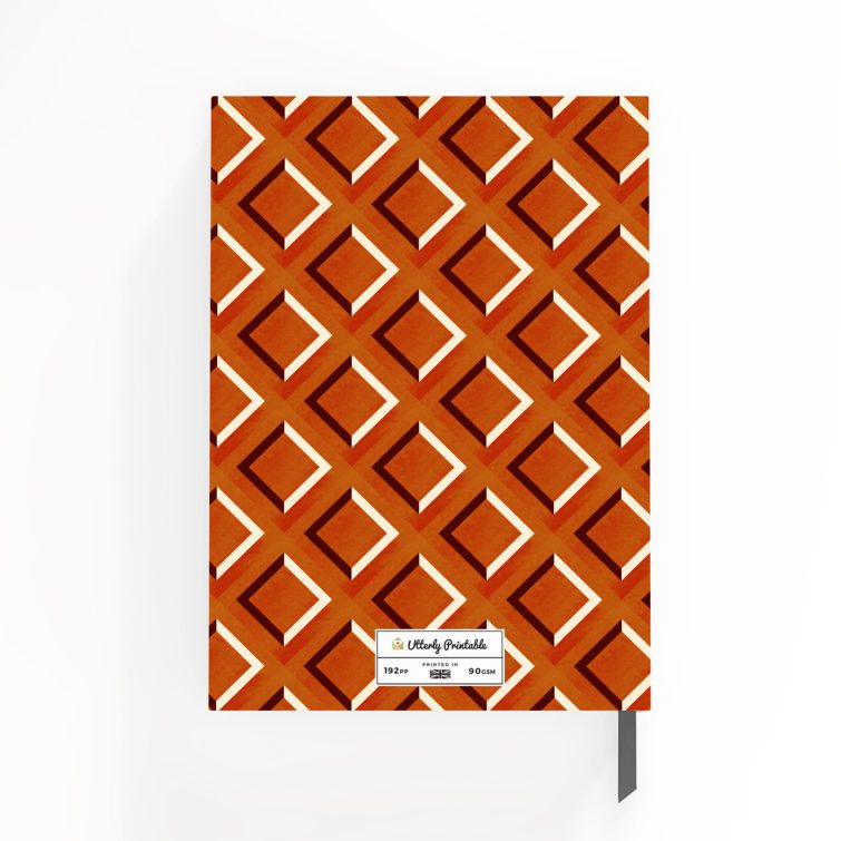 Geometric patterned notebook cover design with classic red and orange diamond shapes suitable for personalised printing, featuring one placeholder photo spot.