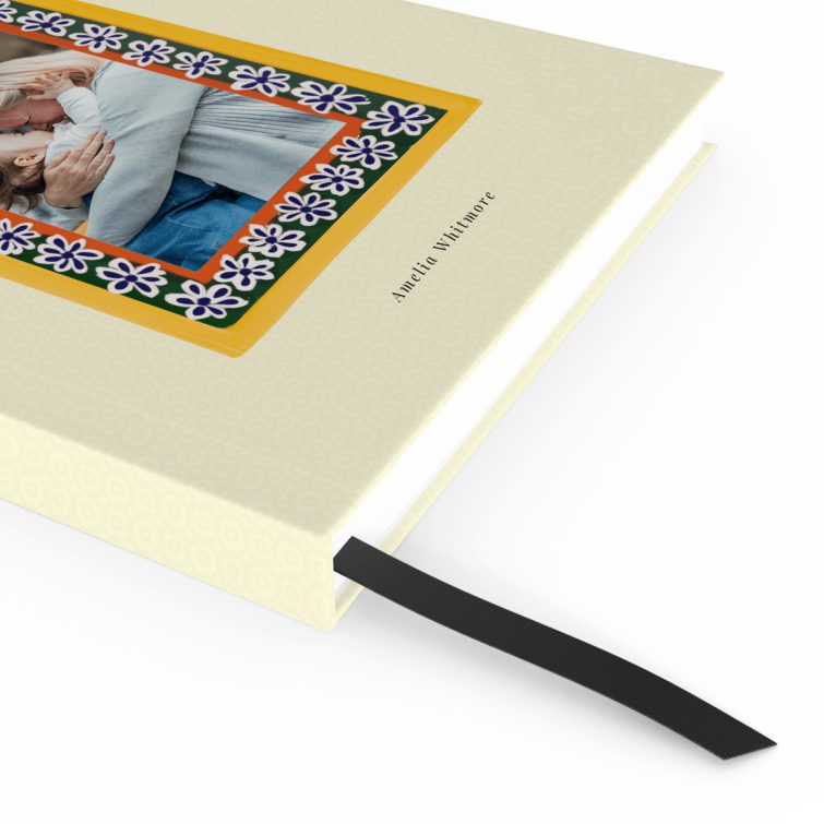 Portrait orientation notebooks design with floral border and one photo on the cover.