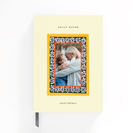 Portrait orientation notebooks design with floral border and one photo on the cover.