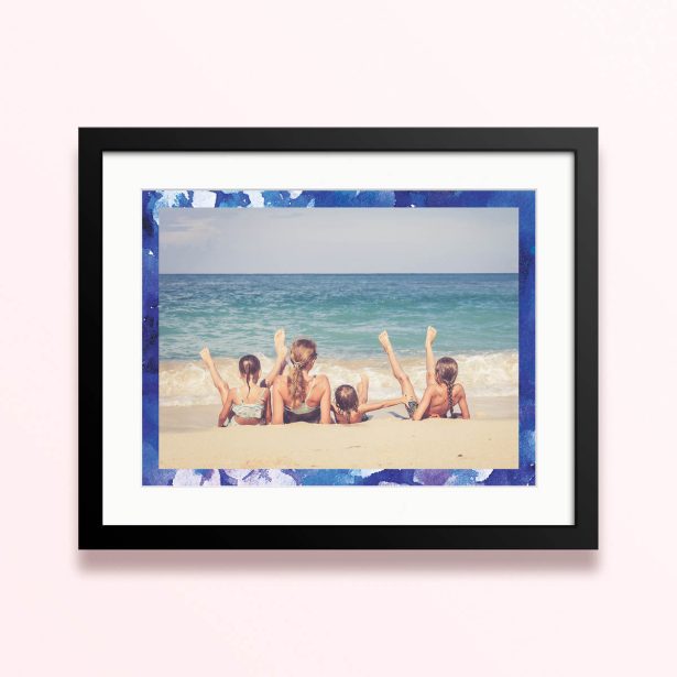 Framed and mounted photo print with four photos against a beach backdrop