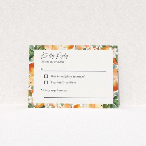 RSVP card from the "Orchard Blossom" suite, featuring a watercolour fruit and flower border in peach, orange, and soft greens, inspired by blooming gardens and perfect for couples seeking a bright and airy theme for their wedding stationery This is a view of the front