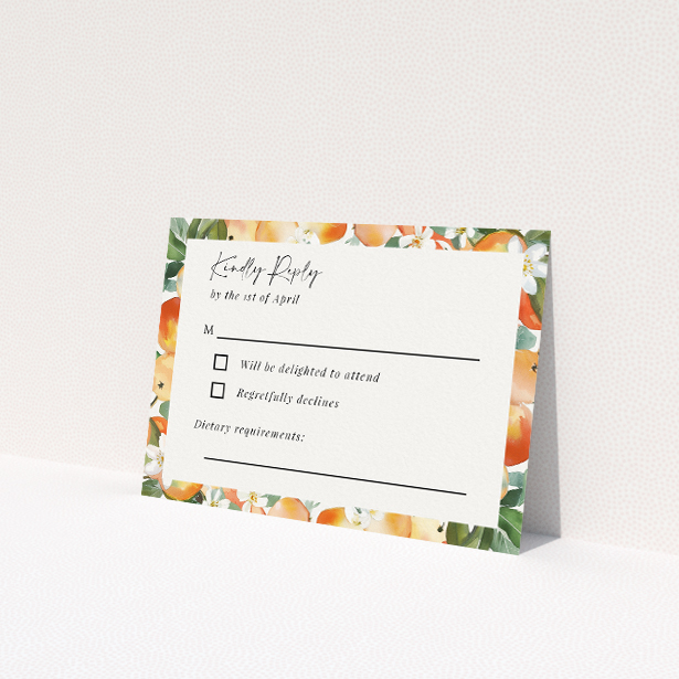 RSVP card from the 'Orchard Blossom' suite, featuring a watercolour fruit and flower border in peach, orange, and soft greens, inspired by blooming gardens and perfect for couples seeking a bright and airy theme for their wedding stationery This is a view of the front