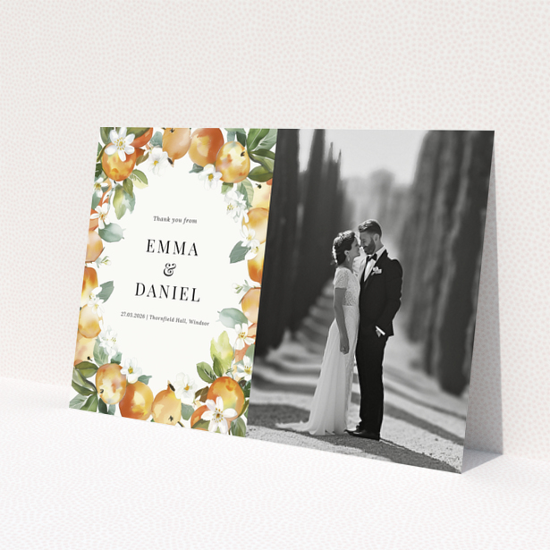 Wedding thank you card with floral design and one black and white wedding photo.