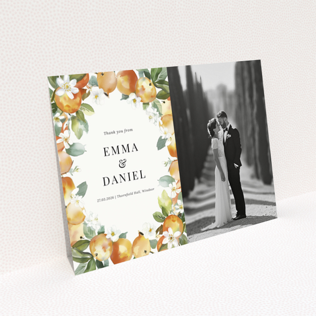 Wedding thank you card with floral design and one black and white wedding photo.