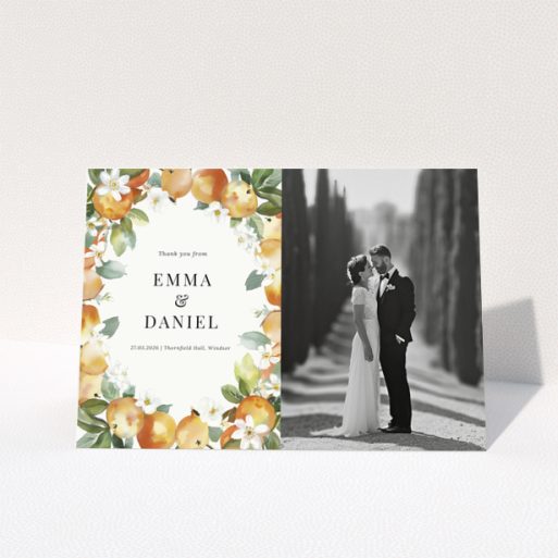 Wedding thank you card with floral design and one black and white wedding photo.