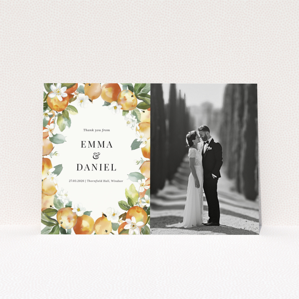 Wedding thank you card with floral design and one black and white wedding photo.