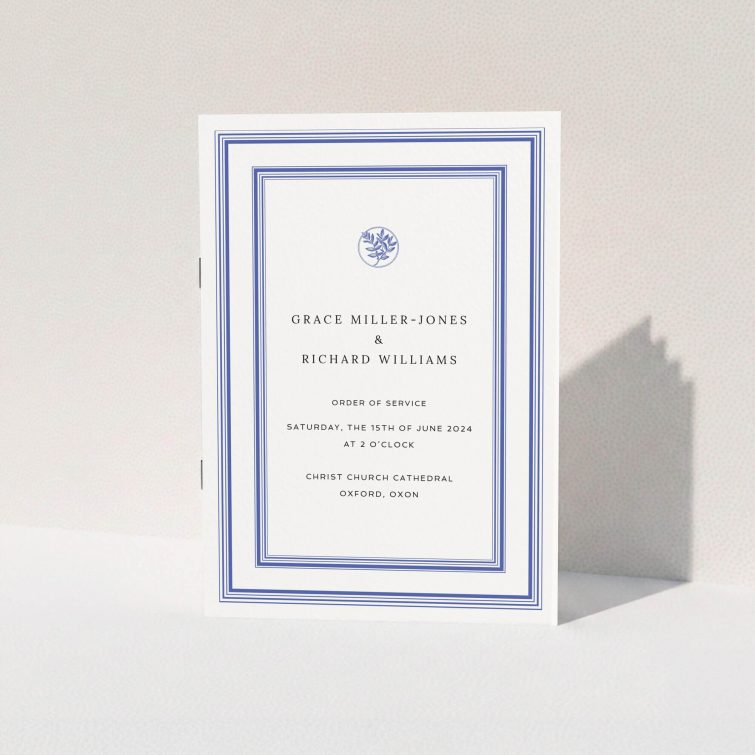 A5 Wedding Order of Service booklet with classic navy blue text and detailing on a crisp white background, adorned with a laurel wreath icon symbolizing victory and celebration This is a view of the front