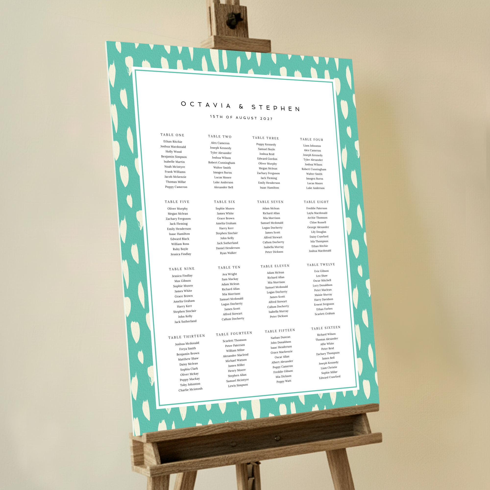 Foamex Painted Playfulness Seating Plans featuring cream paint daubs on a duck shell blue background, adding a modern and playful touch with a burst of color and joy, creating a vibrant and summery atmosphere for your special day.. This template shows 16 tables.
