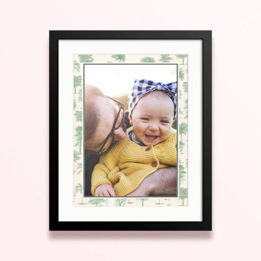 Framed and mounted photo print featuring one photo with a decorative palm tree patterned background.