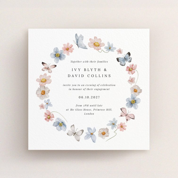 Floral wreath design engagement party invitations with butterfly and flower illustrations.