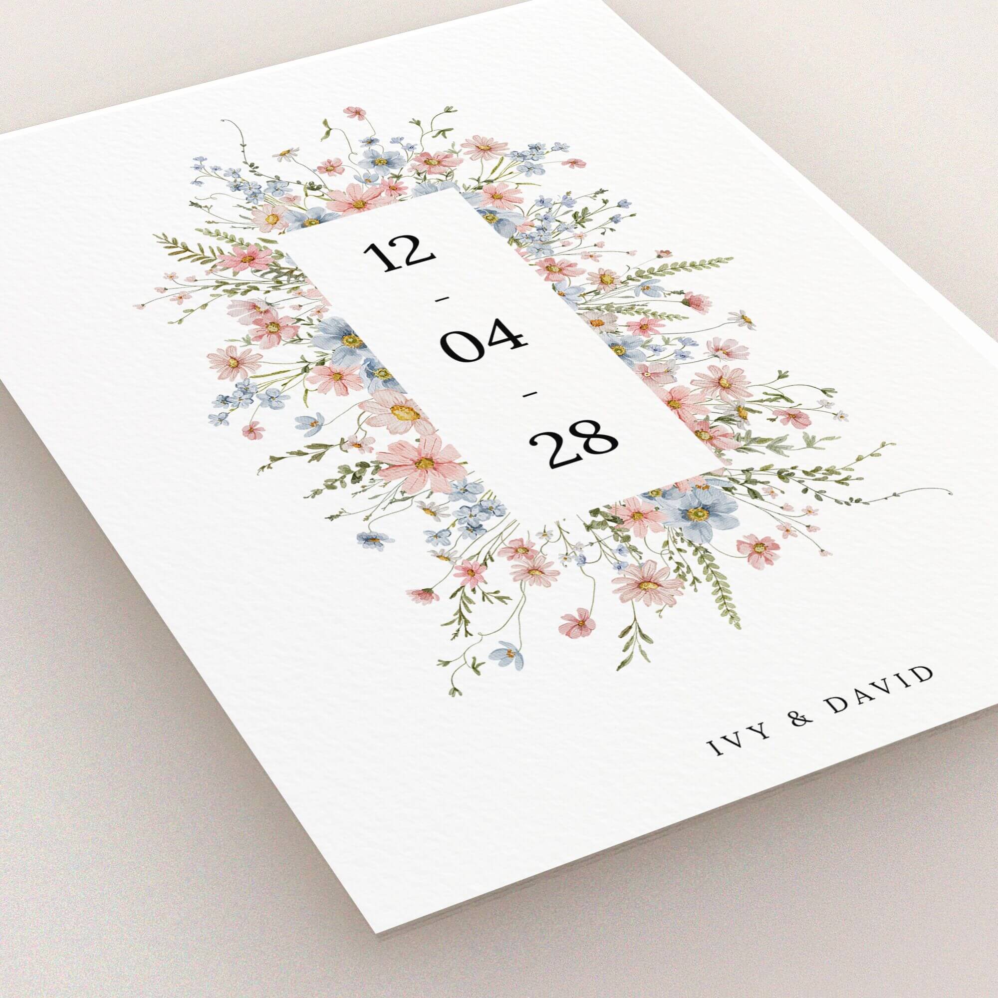 Floral wedding save the date card design with botanical accents, featuring zero photos.