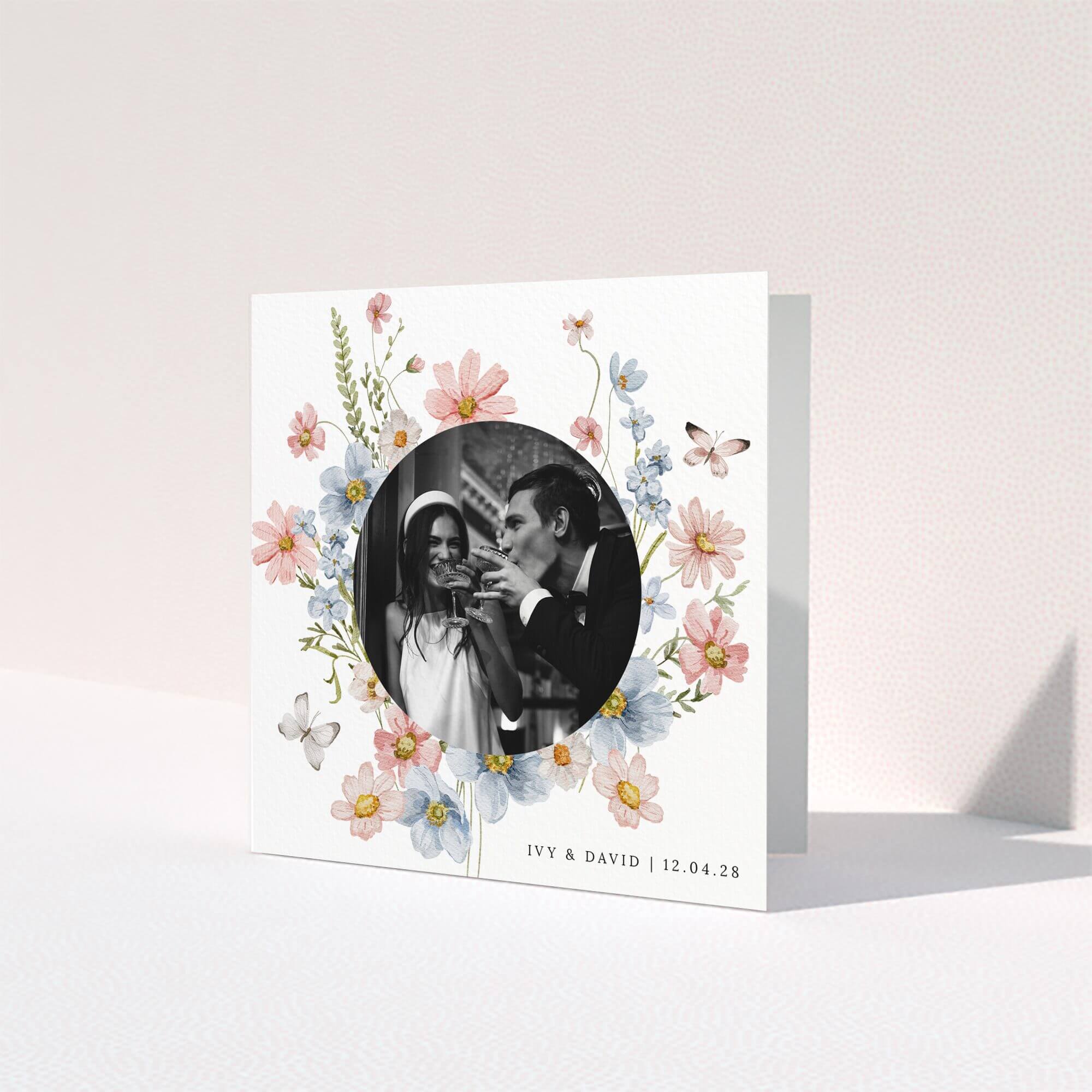 Floral wedding thank you card design with one photo of a couple celebrating