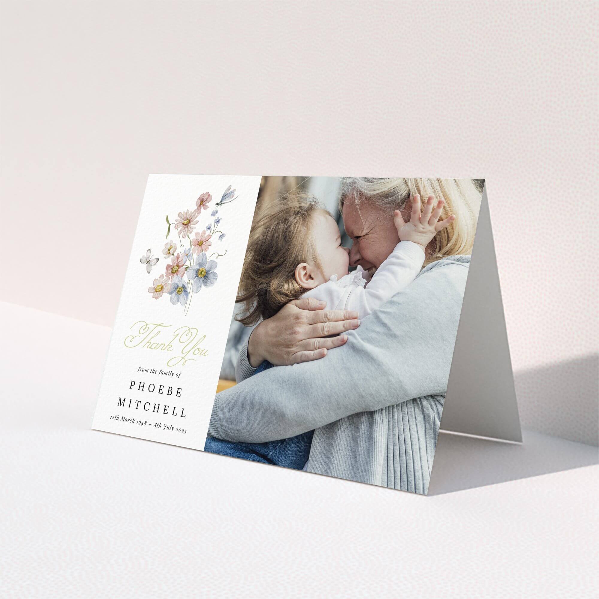 Funeral thank you card design with floral illustration and one photo of a family embrace.