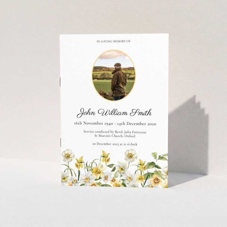 Funeral order of service program design with floral border and one photo.