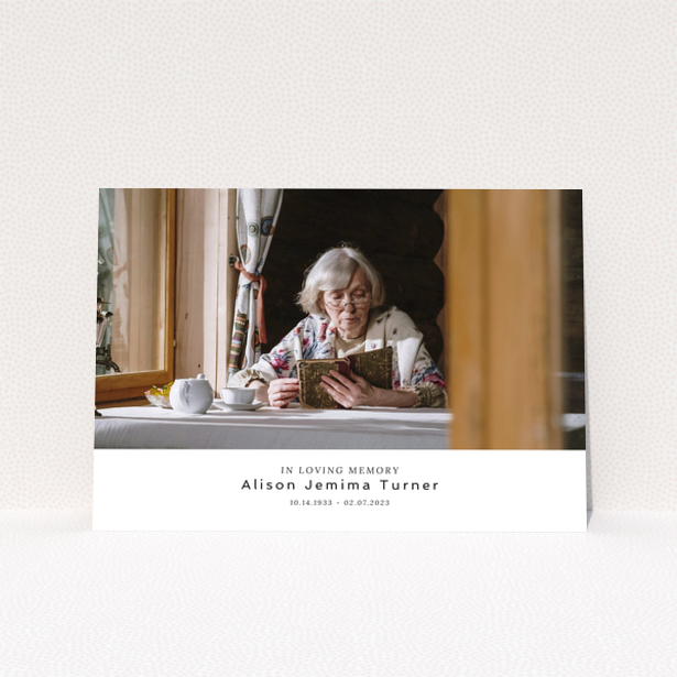 Funeral announcement with one photo featuring an elderly woman reading a book