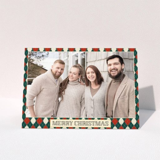 A personalised christmas card called "Argyle Chic". It is an A6 card in a landscape orientation. It is a photographic personalised christmas card with room for 1 photo. "Argyle Chic" is available as a folded card, with tones of festive green and red.