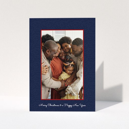 A personalised christmas card called "Blue and Red". It is an A6 card in a portrait orientation. It is a photographic personalised christmas card with room for 1 photo. "Blue and Red" is available as a folded card, with tones of red and blue.