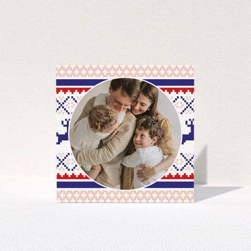 A personalised christmas card template titled "Christmas Stitch". It is a square (148mm x 148mm) card in a square orientation. It is a photographic personalised christmas card with room for 1 photo. "Christmas Stitch" is available as a folded card, with tones of pink, navy blue and red.