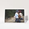 A personalised christmas card called "Holiday Wishes". It is an A5 card in a landscape orientation. It is a photographic personalised christmas card with room for 1 photo. "Holiday Wishes" is available as a folded card, with mainly white colouring.