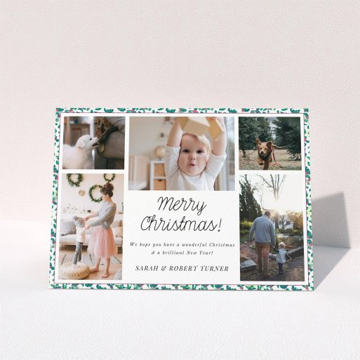A personalised christmas card template titled "Holly Border". It is an A5 card in a landscape orientation. It is a photographic personalised christmas card with room for 5 photos. "Holly Border" is available as a folded card, with tones of green, red and white.