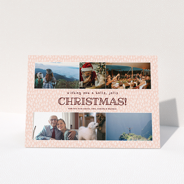 A personalised christmas card named "Pink Forrest". It is an A5 card in a landscape orientation. It is a photographic personalised christmas card with room for 6 photos. "Pink Forrest" is available as a folded card, with mainly pink colouring.