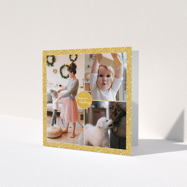 A personalised christmas card design titled 'Sparkling Gold'. It is a square (148mm x 148mm) card in a square orientation. It is a photographic personalised christmas card with room for 3 photos. 'Sparkling Gold' is available as a folded card, with tones of gold and white.