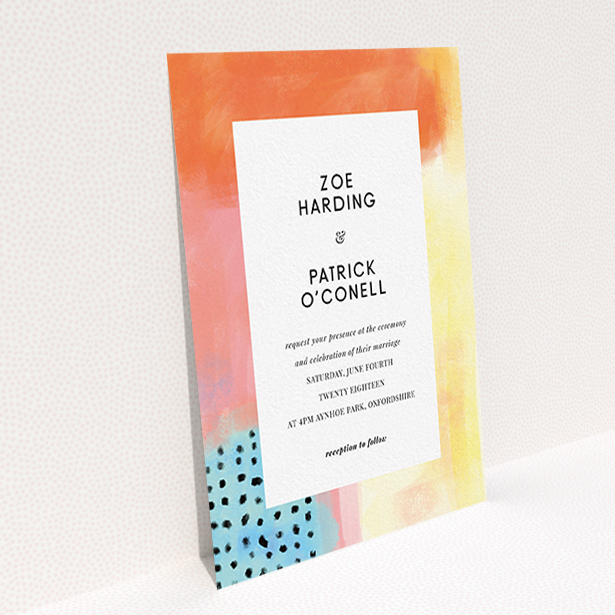 A personalised wedding invitation design titled "Abstract Colours". It is an A6 invite in a portrait orientation. "Abstract Colours" is available as a flat invite, with tones of orange, red and yellow.