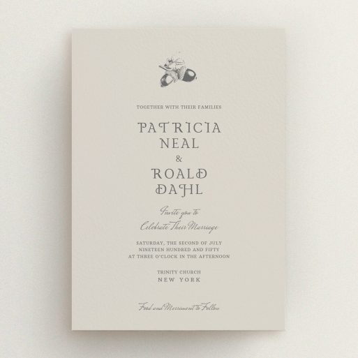 A personalised wedding invitation template titled "Acorn stamp". It is an A5 invite in a portrait orientation. "Acorn stamp" is available as a flat invite, with mainly dark cream colouring.