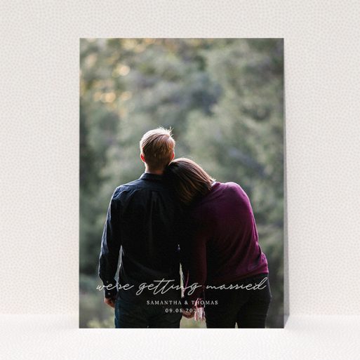 A personalised wedding invitation called "Across the Photo". It is an A5 invite in a portrait orientation. It is a photographic personalised wedding invitation with room for 1 photo. "Across the Photo" is available as a flat invite, with mainly white colouring.