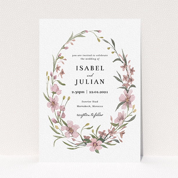 A personalised wedding invitation called "Autumn Floral Wreath". It is an A6 invite in a portrait orientation. "Autumn Floral Wreath" is available as a flat invite, with tones of faded pink and autumnal green.