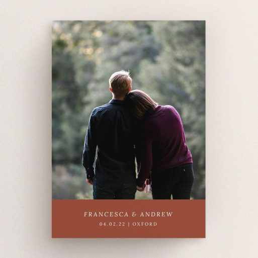 A personalised wedding invitation named "Autumnal Photo". It is an A5 invite in a portrait orientation. It is a photographic personalised wedding invitation with room for 1 photo. "Autumnal Photo" is available as a flat invite, with mainly dark orange colouring.
