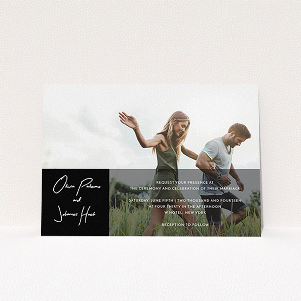 A personalised wedding invitation template titled "Black on black". It is an A6 invite in a landscape orientation. It is a photographic personalised wedding invitation with room for 1 photo. "Black on black" is available as a flat invite, with mainly black colouring.