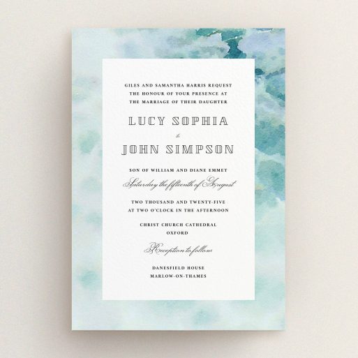 A personalised wedding invitation design named "Calm Waters". It is an A5 invite in a portrait orientation. "Calm Waters" is available as a flat invite, with tones of blue and white.