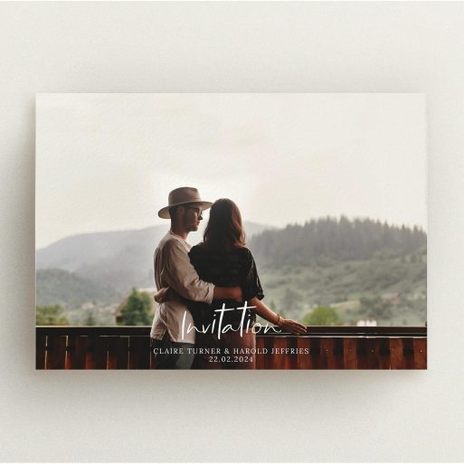 A personalised wedding invitation called "Central Script". It is an A5 invite in a landscape orientation. It is a photographic personalised wedding invitation with room for 1 photo. "Central Script" is available as a flat invite, with mainly white colouring.