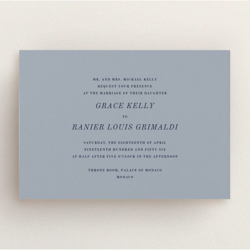 A personalised wedding invitation design named "Dark and Stormy". It is an A5 invite in a landscape orientation. "Dark and Stormy" is available as a flat invite, with tones of dark grey and navy blue.