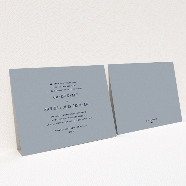 A personalised wedding invitation design named "Dark and Stormy". It is an A5 invite in a landscape orientation. "Dark and Stormy" is available as a flat invite, with tones of dark grey and navy blue.