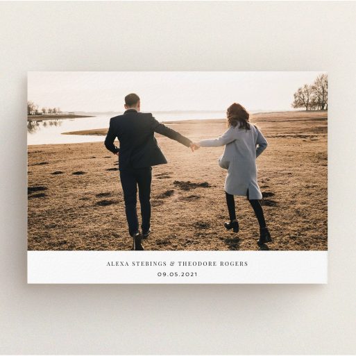 A personalised wedding invitation design called "Duke of York Square". It is an A5 invite in a landscape orientation. It is a photographic personalised wedding invitation with room for 1 photo. "Duke of York Square" is available as a flat invite, with mainly white colouring.